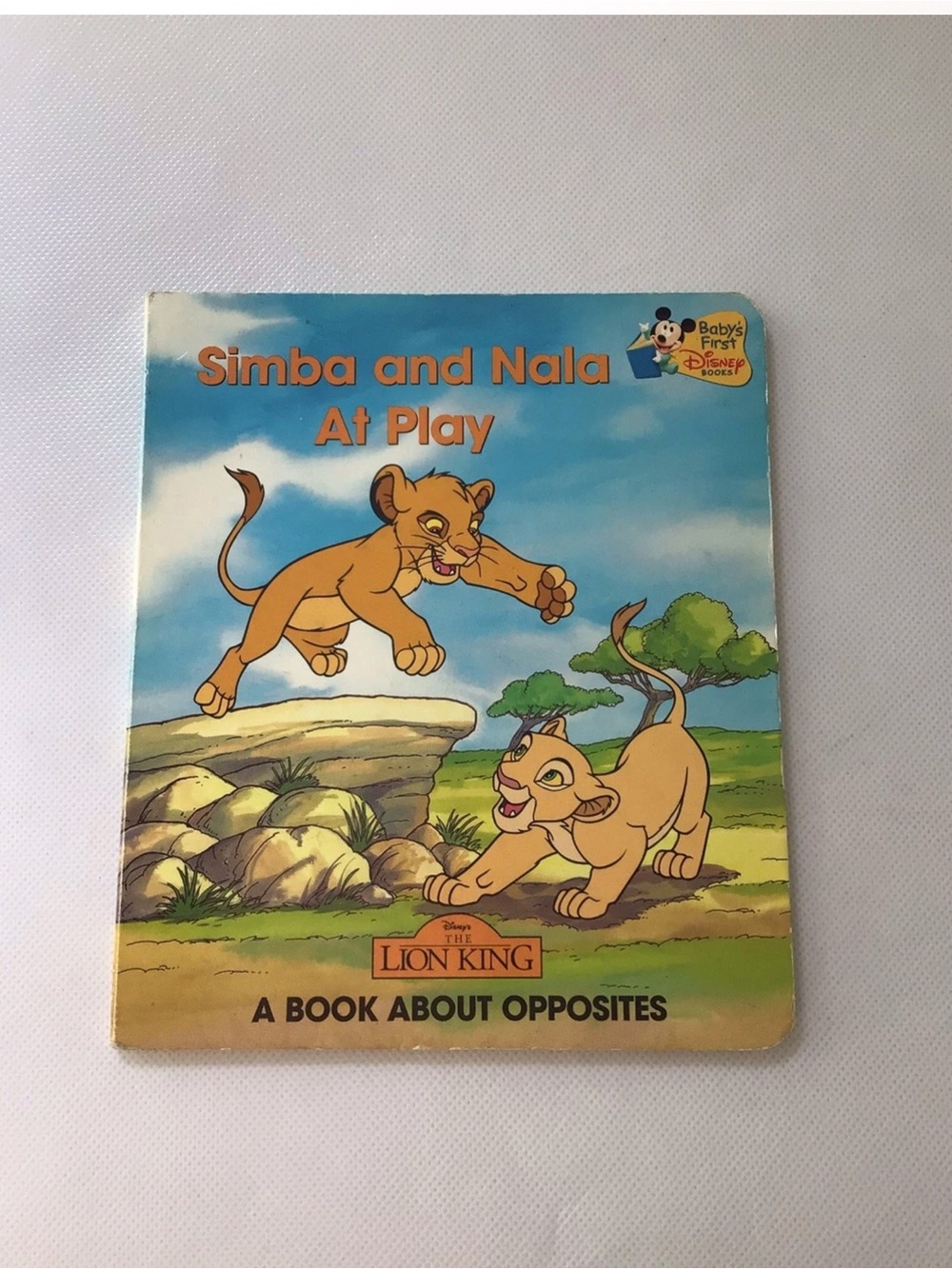 Disney The Lion King: Simba and Nala At Play (A BOOK ABOUT OPPOSITES, LION KING)